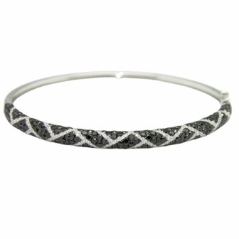 Brazalete de oro blanco de 14 kts con diamantes negro y blancos