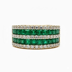 18 kts bicolor gold ring with emeralds and diamonds