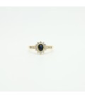 18 kts yellow gold ring with blue sapphire and zircons