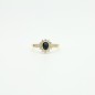 18 kts yellow gold ring with blue sapphire and zircons