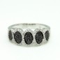 14 kts white gold ring with black and white diamonds
