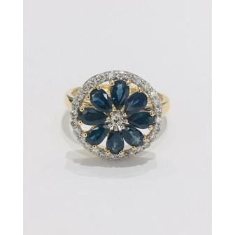 SORTIJA DE ORO BICOLOR DE 18 KTS CON ZAFIRO AZUL Y DIAMANTES