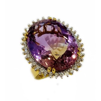 Sortija de Ametrina y diamantes montado en oro amarillo 18 cts.