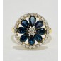 SORTIJA DE ORO BICOLOR DE 18 KTS CON ZAFIRO AZUL Y DIAMANTES