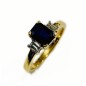 Sortija de oro amarillo de 18 kts con zafiro azul y diamantes