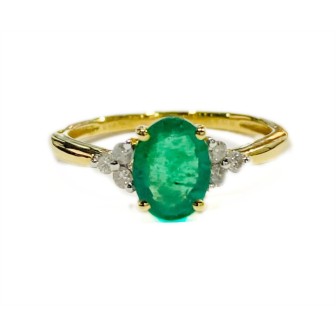 18 kts yellow gold ring with emeralds and diamonds