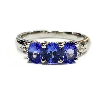 Sortija de oro blanco 14 kts con tanzanita y diamantes