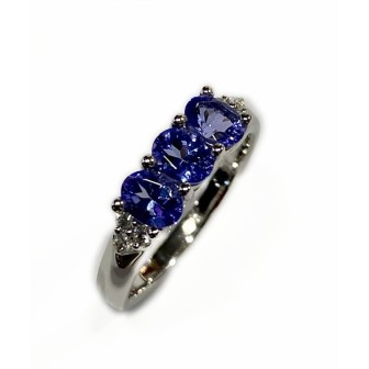 Sortija de oro blanco 14 kts con tanzanita y diamantes