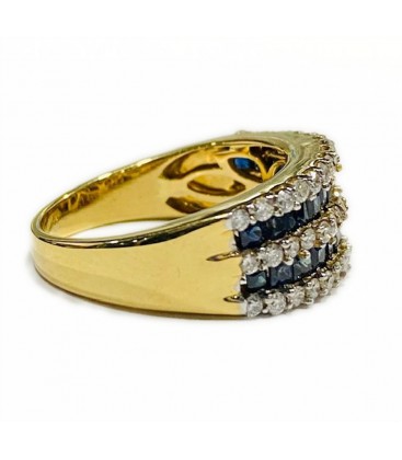 18 kts bicolor gold ring with blue sapphire and diamonds