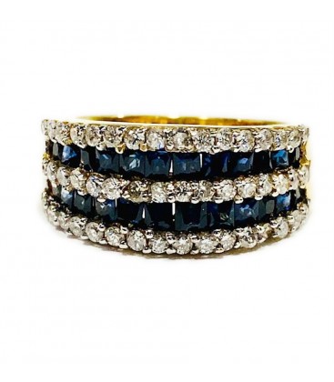 18 kts bicolor gold ring with blue sapphire and diamonds