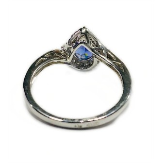 Sortija de oro blanco 14 kts con tanzanita y diamantes