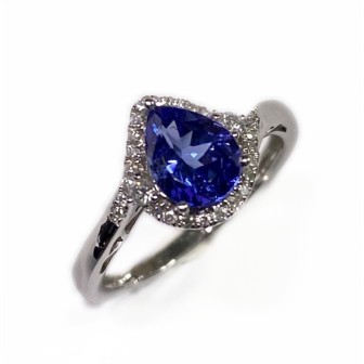 Sortija de oro blanco 14 kts con tanzanita y diamantes
