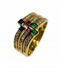 Combination of 3 rings with precious stones in gold of 18 kts