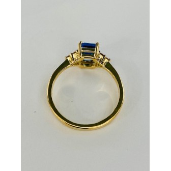 SORTIJA DE TOPACIO AZUL Y DIAMANTES MONTADO EN ORO AMARILLO 18CTS