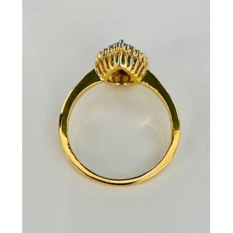 SORTIJA DE TOPACIO AZUL Y DIAMANTES MONTADO EN ORO AMARILLO 18CTS