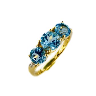 SORTIJA DE TOPACIO AZUL Y DIAMANTES MONTADO EN ORO AMARILLO 18CTS