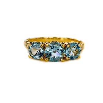 SORTIJA DE TOPACIO AZUL Y DIAMANTES MONTADO EN ORO AMARILLO 18CTS