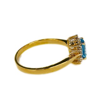 SORTIJA DE TOPACIO AZUL Y DIAMANTES MONTADO EN ORO AMARILLO 18CTS