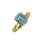 SORTIJA DE TOPACIO AZUL Y DIAMANTES MONTADO EN ORO AMARILLO 18CTS