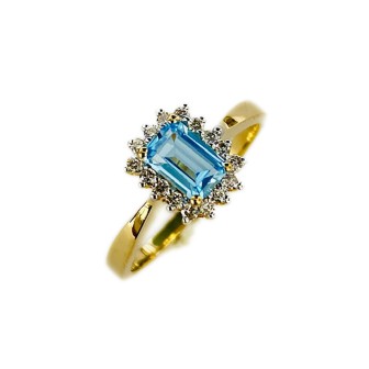 SORTIJA DE TOPACIO AZUL Y DIAMANTES MONTADO EN ORO AMARILLO 18CTS