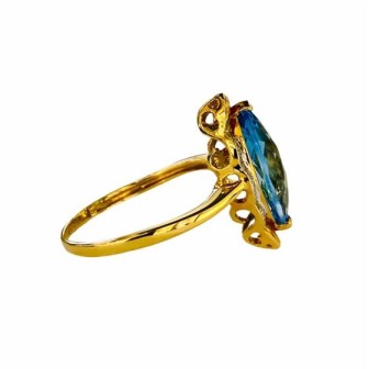 SORTIJA DE TOPACIO AZUL Y DIAMANTES MONTADO EN ORO AMARILLO 18CTS